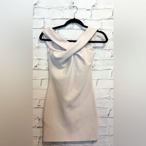 Bec + Bridge Light Pink Cross Front Mini Dress
Size 4